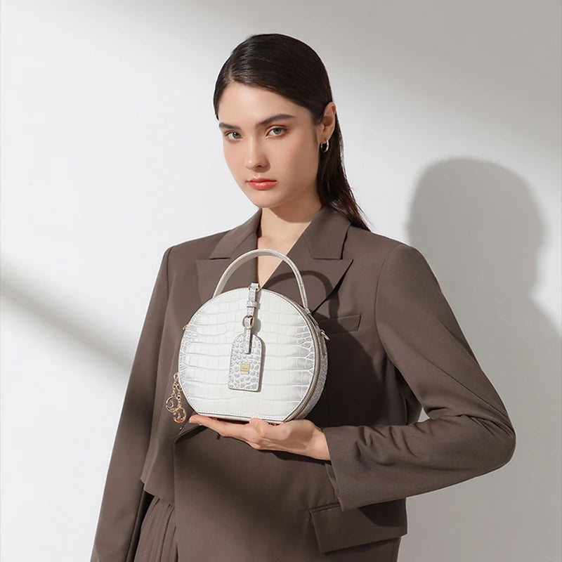Bolso circular cruzado de piel auténtica para mujer, bolso de diseñador de lujo de marca famosa con patrones
